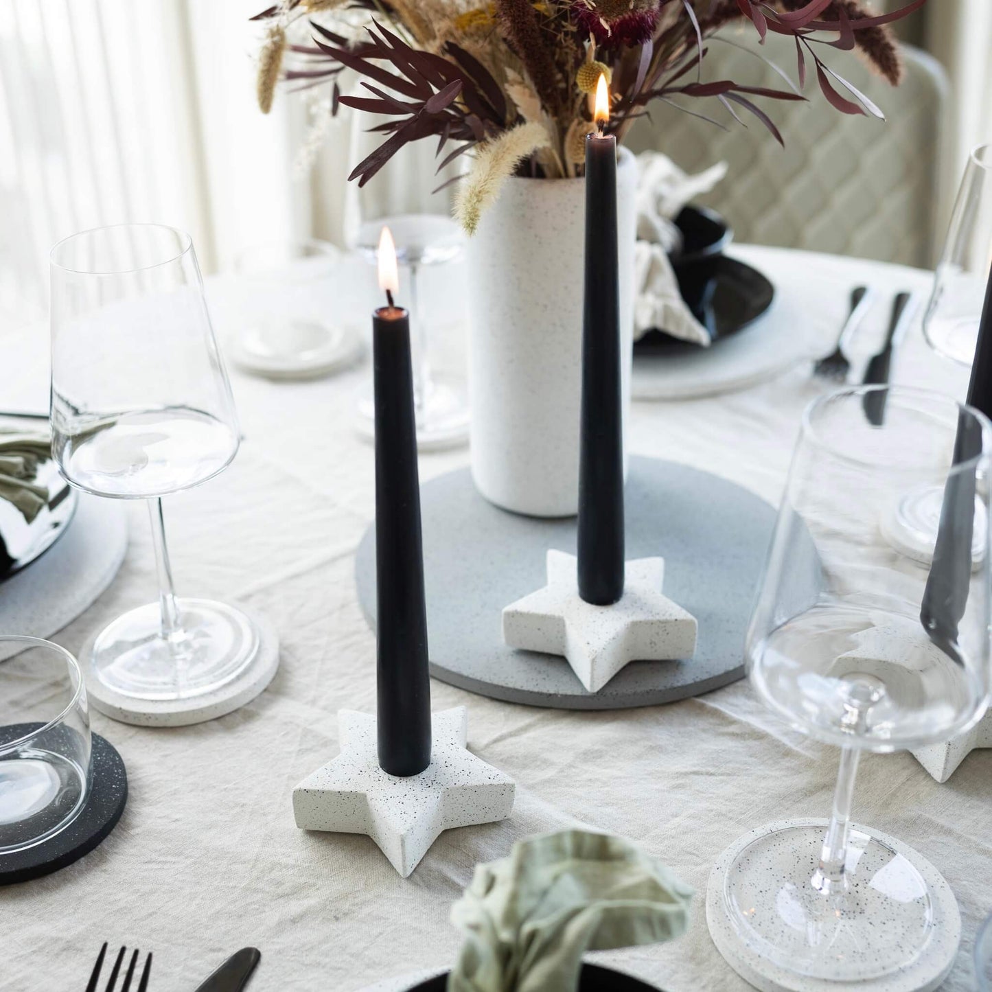 White Star Shaped Concrete Candle Holder in a table setting