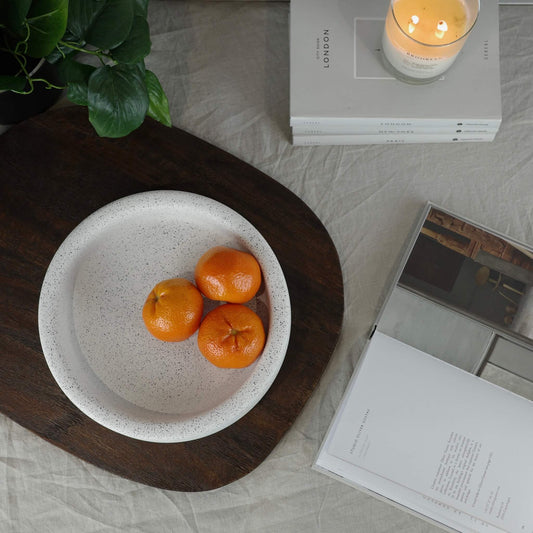 White round eco concrete fruit bowl on a table 