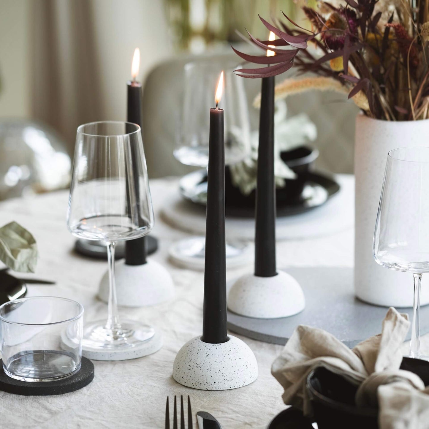 white eco concrete dome shaped candle holders in a tableware setting